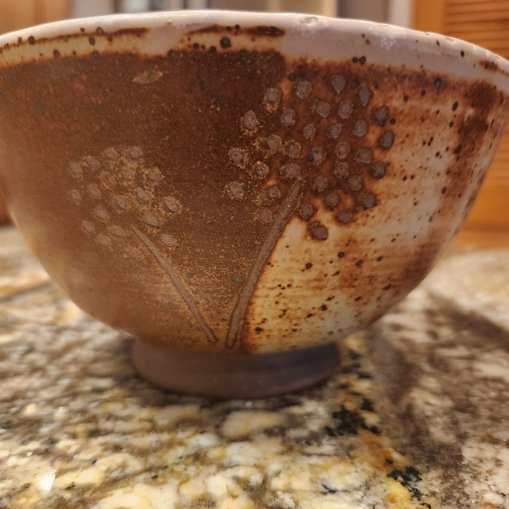 Pottery caramel and cream outer signed ss.  And turquoise and cream glaze